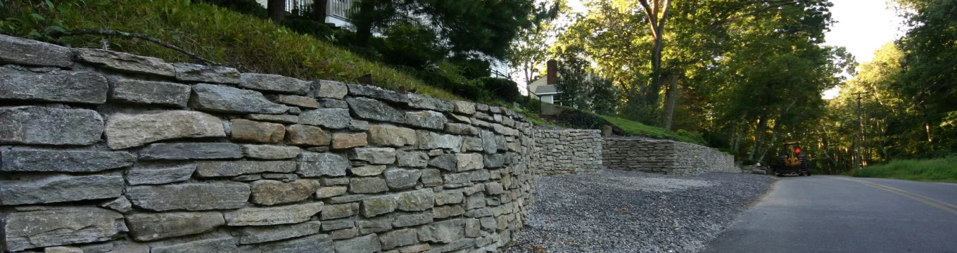 Natural stone retaining wall in Connecticut by Royal Oak Landscape