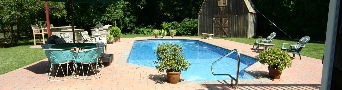 Paver patio poolscape in Connecticut by Royal Oak Landscape